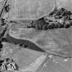 Inverdunning House, oblique aerial view, taken from the S, centred on the cropmarks including those of pits. Cropmarks of an enclosure are visible in the bottom right-hand corner of the photograph, and Inverdunning House is visible in the top half.