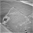 Muirhead, Myretown Wood and Drum of Garvock, oblique aerial view, taken from the N, centred on the cropmarks of two enclosures and linear cropmarks. Two possible possible enclosures are visible in the top left-hand corner of the photograph.