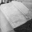 Oblique aerial view centred on the cropmarks of the enclosures, taken from the S.