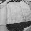 Oblique aerial view centred on the cropmarks of the enclosures, taken from the SSE.