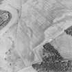 Oblique aerial view centred on the cropmarks of enclosures, henges, ring-ditches, a pit-enclosure and barrows, taken from the S.