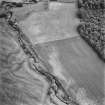 Kincladie, oblique aerial view, taken from the WSW, centred on an area of cropmarks, including those of a pit-circle and pits.