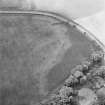 Green of Invermay, oblique aerial view, taken from the NE, centred on the cropmark of a ring-ditch. Parts of a possible pit-alignment are visible in the bottom half of the photograph, and further pits can be seen in the top left-hand corner.