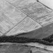 Oblique aerial view of Henhill centred on cropmarks, taken from the E.
