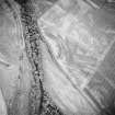 Oblique aerial view centred on the geological cropmarks with rig adjacent, taken from the NNE.