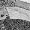 Dun Knock, Dunning, oblique aerial view, taken from the SE, centred on the cropmarks of the fort.