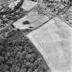 Dun Knock, Dunning, oblique aerial view, taken from the ESE, centred on the cropmarks of the fort.