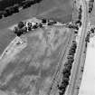 Oblique aerial view centred on linear cropmarks, taken from the NNW.