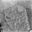 Oblique aerial view of loak centred on the cropmarks of a pit-alignment, taken from the NNW.