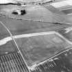 Oblique aerial photograph of Carey centred on crop marks from temporary Roman camp