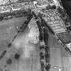 Oblique aerial view centred on the excavations of the Cromwellian fort, taken from the SSW.