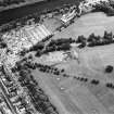 Oblique aerial view centred on the excavations of the Cromwellian fort, taken from the NW.