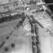 Oblique aerial view centred on the excavations of the Cromwellian fort, taken from the SW.