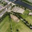 Oblique aerial view centred on the excavations of the Cromwellian fort, taken from the SW.