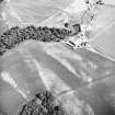Cambusmichael, oblique aerial view taken from the W, centred on the cropmarks of two seperate enclosures, settlement traces and a grange.