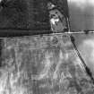 Myreside, oblique aerial view, taken from the NNW, showing cropmarks, including those of a ring ditch and a possible pit-defined enclosure, in the centre. A linear cropmark runs across the centre of the photograph.