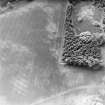 Kinloch, oblique aerial view, taken from the E, centred on the cropmarks of an unenclosed settlement and cultivation remains.