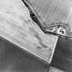 Oblique aerial photograph of Reedieleys centred on cropmarks, including cultivation remains and rig, taken from the NW.