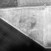 Oblique aerial view centred on the cropmarks of the unenclosed settlement and souterrains, taken from the NNE.