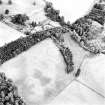 Balhary, oblique aerial view, taken from the N, centred on the cropmarks of an enclosure.