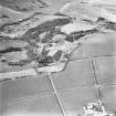 General aerial view of possible quarry remains at Claybrigs, taken from the NW.