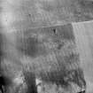 Oblique aerial view of East Bank unenclosed settlement and souterrains.