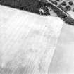 Oblique aerial view centred on the cropmarks of the Roman temporary fort, taken from the ESE.