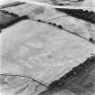 Star Inn Farm, oblique aerial view, taken from the NE, centred on the cropmarks of a pit-alignment and field boundary. Further linear cropmarks, square barrows and ring-ditches are visible in the centre left of the photograph.