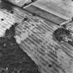 Mains of Glamis, oblique aerial view, taken from the SW, showing a pair of linear cropmarks in the centre of the photograph.