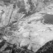 Oblique aerial view of the remains of the township and rig, taken from the N.