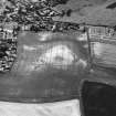 Kirkton of Largo, oblique aerial view, taken from the NE, centred on the cropmarks of a ring-ditch, enclosure and pits.