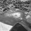 Kirkton of Largo, oblique aerial view, taken from the NE, centred on the cropmarks of a ring-ditch, enclosure and pits.