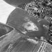 Kirkton of Largo, oblique aerial view, taken from the NW, centred on the cropmarks of a ring-ditch, enclosure and pits.