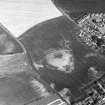 Kirkton of Largo, oblique aerial view, taken from the W, centred on the cropmarks of a ring-ditch, enclosure and pits.