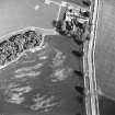 Forgan Church, oblique aerial view, taken from NW, centred on a cropmark of a possible square barrow, with Forgan Parish Church to the top of the photograph.