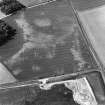 Kirkton Barns, oblique aerial view, taken from the S, centred on cropmarks of an unenclosed settlement.