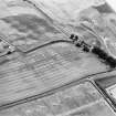 Oblique aerial view of Kirktonbarns cropmark complex, taken from the NW.