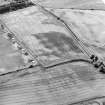 Oblique aerial view of Kirktonbarns cropmark complex, taken from the WNW.