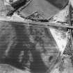 Hawkhill, oblique aerial view, taken from the SE, centred on the cropmarks of an unenclosed settlement.