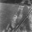 Hawkhill, oblique aerial view, taken from the SSW, centred on the cropmarks of an unenclosed settlement.