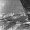 Hawkhill, oblique aerial view, taken from the SE, centred on the cropmarks of an unenclosed settlement.