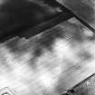 Craigmill, oblique aerial view, taken from the E, centred on the cropmarks of a barrow cemetery, ring-ditches, pits and rig.