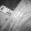 Oblique aerial view centred on the cropmarks of the possible settlement and linear cropmarks, taken from the SW.