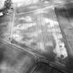 Boysack and Chapelton, oblique aerial view, taken from the SW, centred on the cropmarks of two unenclosed settlements.