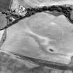 Oblique aerial view centred on the cropmarks of the barrows, ring-ditches and square barrows, taken from the WSW.