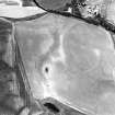 Oblique aerial view centred on the cropmarks of the barrows, ring-ditches and square barrows, taken from the SSE.