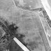 Oblique aerial view centred on the cropmarks of the unenclosed settlement, enclosures, possible souterrains, linear cropmarks and possible field boundaries, taken from the S.