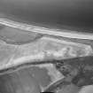 Oblique aerial view centred on the cropmarks of the unenclosed settlement and linear cropmarks, taken from the WSW.