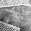 Oblique aerial view centred on the cropmarks of the enclosure, ring-ditch, linear cropmarks, pits and cropmarks, taken from the NW.