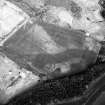 Arrat's Mill, oblique aerial view, taken from the SW, centred on the cropmarks of an unenclosed settlement, souterrains and pit-circles.